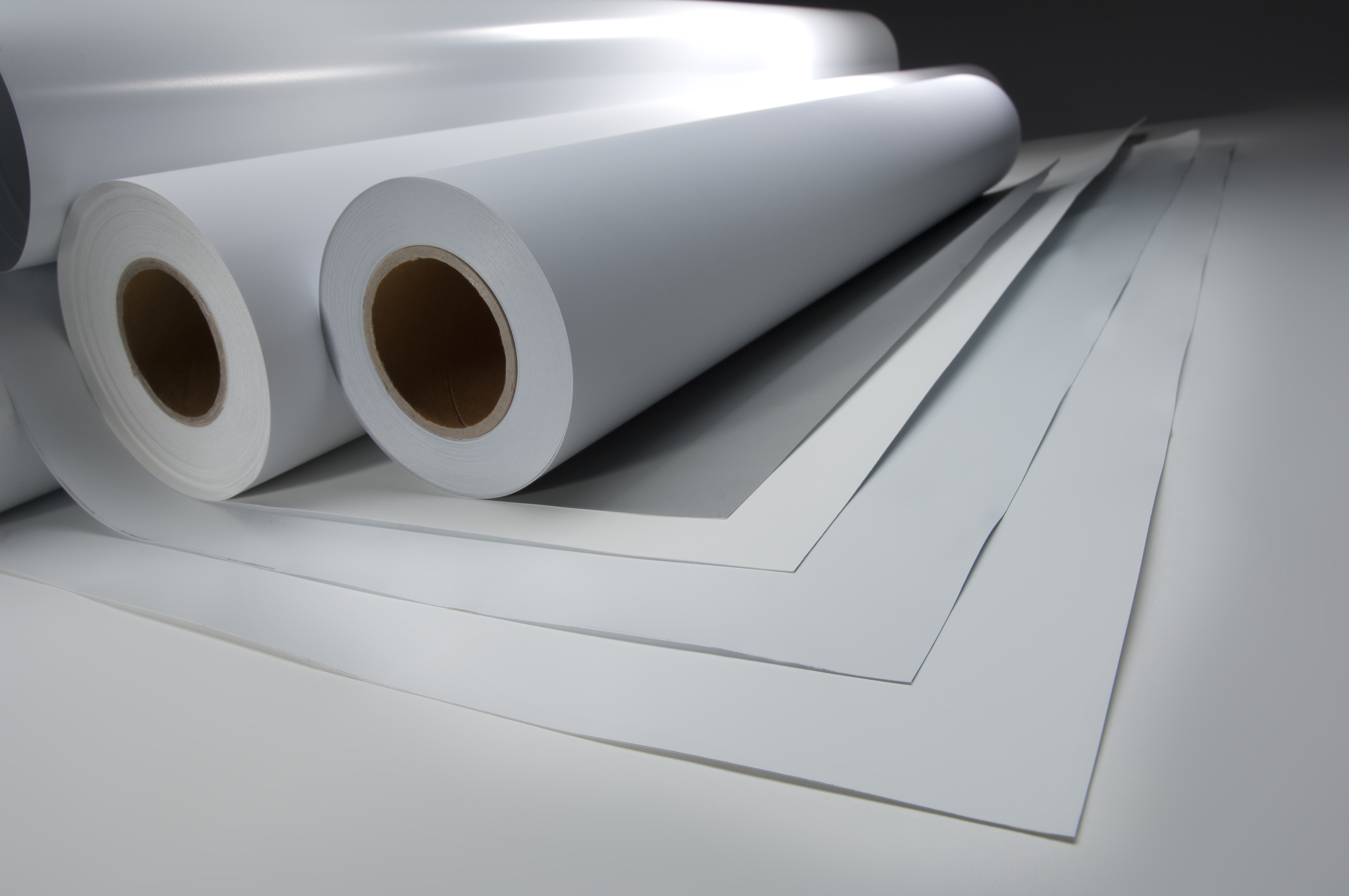 Photo of banner media / material in rolls.