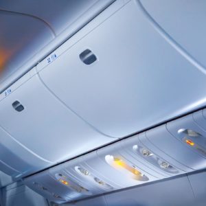 PVC sheets Toronto- Photo of an airplane using PVC acrylic sheets for overhead bins